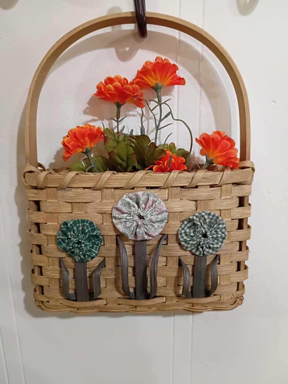 Woven Wall Basket with Orange Floral Accents